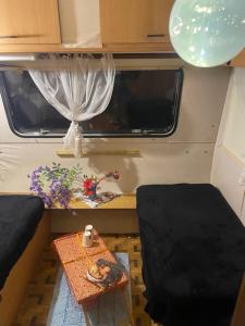 a view of a room with a table and a bed and a table sidx sidx at Second&Home in Przeźmierowo +12 photos