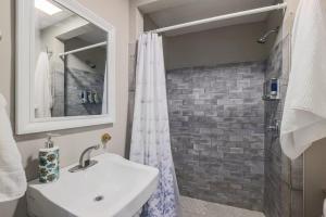 a bathroom with a sink and a shower at Cozy Room in the City of Worcester in Worcester +40 photos