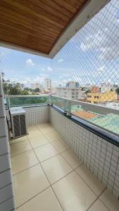an empty balcony with a view of a city at Flat Premium no Centro Tudo a Pé in Montes Claros