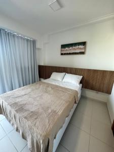 a bedroom with a large bed in a room at Mana Beach Experience in Ipojuca +23 photos