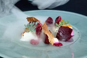 a plate of desserts on a white plate at Gasthaus Hofmann in Schindelsee