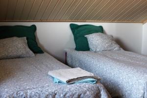 سرير أو أسرّة في غرفة في Villa Lanca Activities