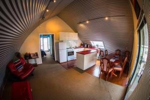 an overhead view of a kitchen and a living room at Blue Monkey Mountains in Newnes Junction +8 photos