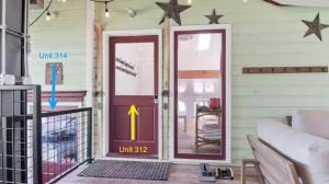 an open door with a yellow arrow pointing to a unit at Summit Home Multi-level with PC Views Ski Trail in Park City