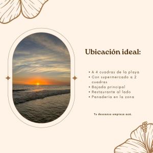 a picture of the ocean and the sunset through a window at MonSua in San Luis