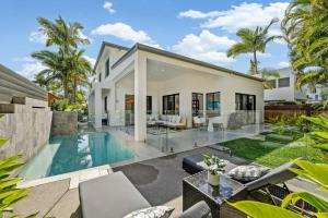an image of a villa with a swimming pool at Noosa Village River Resort in Noosaville