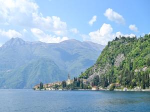 a large body of water with mountains in the background at Sognando Varenna-Lake Como View- in Fiumelatte
