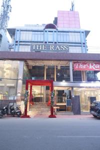 a building with a red arch in front of it at The Rass in Kānpur