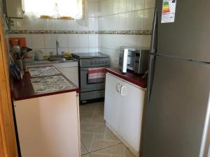 Kuchyň nebo kuchyňský kout v ubytování Casa en Algarrobo Norte