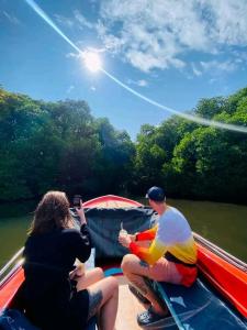 a group of people on a boat on a river at Vivid Lanka in Bentota