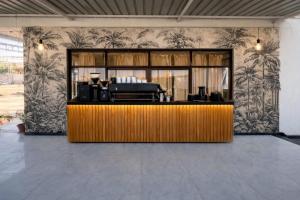a lobby with a counter in a room at Udaigarh Palace - The Heritage Hotel in Jodhpur
