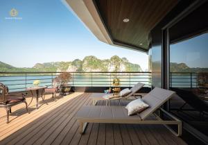 a balcony with a view of the water at Diana Cruises Halong Bay - Luxury by Venus Group in Ha Long