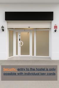 an entry to the hostel is only possible with individual key panels at Cozy Nook in Valencia