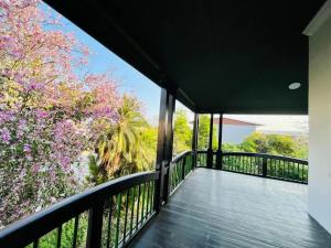 a view from the balcony of a house at HEBA GUEST LODGE in Uitenhage +8 photos