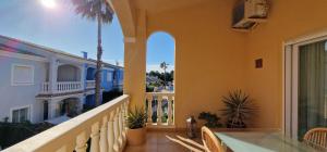 a balcony of a house with a view of the ocean at Casa Mila in El Verger
