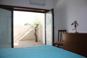 Ένα ή περισσότερα κρεβάτια σε δωμάτιο στο Casa do Ferrador