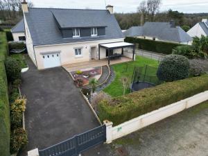an aerial view of a house with a backyard at Le clos du bas in Noyal-Muzillac