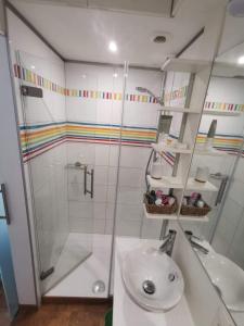 a bathroom with a shower and a sink at Studio face au château de Thy in Thy-le-Château +34 photos