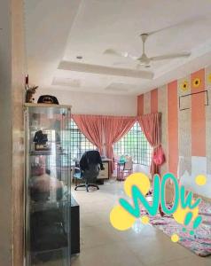 a living room with a view of a room at SemiD in Batu Kikir