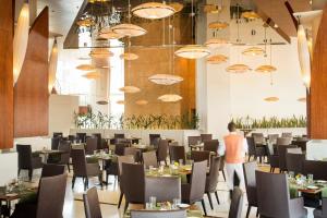 A restaurant or other place to eat at Lagos Continental Hotel