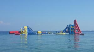 a playground in the middle of the water at Aenaon Corfu Luxury Apartments #05 - Athena Apartment in Ipsos