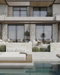 ein Schlafzimmer mit einem Bett neben einem Swimmingpool in der Unterkunft Okeanis Elysium in Daratso + 13 Fotos