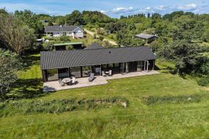 an aerial view of a house with a large yard at 20422-Samso-Egernvej-16 in Ballen