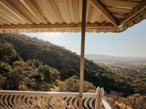 a view from the balcony of a house at Kudu Kopje Lodge in Kroondal +10 photos