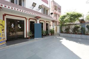 an empty street in front of a building at Bengal Inn in Kolkata