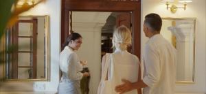a bride and groom standing in front of a mirror at Maya Tangalle Luxury Wellness-Adults Only-Free Unlimited Shuttle service to our private Beach in Tangalle +97 photos