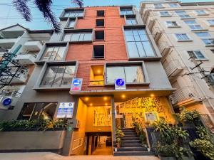 a building with a store in front of it at Zip By Spree Hotels Brookefield in Bangalore