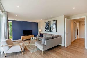 a living room with a couch and a tv at 2 Bed in Padstow oc-28108 in Padstow