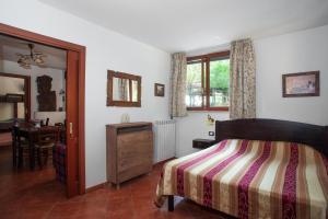 Postel nebo postele na pokoji v ubytování B&B La Nave