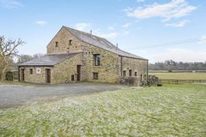 an old stone barn in a field at 3 Bed in Ingleton oc-l34471 in Ingleton