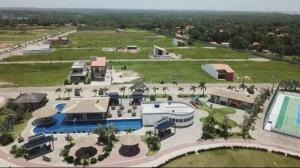 an aerial view of a resort with a swimming pool at Casa em clube in São José de Ribamar