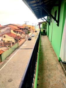 a view of a street from a balcony of a building at Condo Flat Solar de Aquários in Cabo Frio