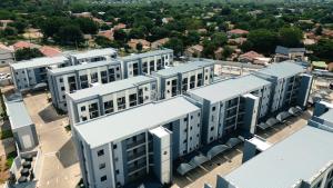 an overhead view of a large white building at Suite 303 in Gaborone