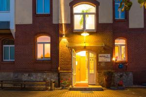 The facade or entrance of Hotel Aviv Dresden