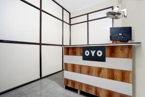 a room with a sign that says oxy at SPOT ON VS in Delhi