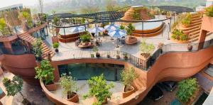 an overhead view of a building with a slide at Khách Sạn Diamond Hotel Văn Giang Hưng Yên in Cửu Cảo