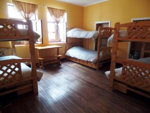 Letto o letti in una camera di Hostel Revolution Quito