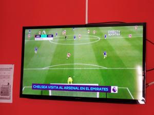 TV o dispositivi per l'intrattenimento presso Hostel Revolution Quito