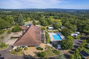 an aerial view of a house with a swimming pool at Camping O'Aka in Leyme