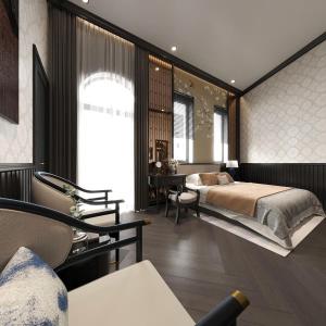 a bedroom with a bed and a desk at Gold Villa in Trai Mat +7 photos