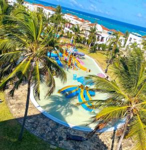 an aerial view of a water park on the beach at Zuri's Beachfront Bliss, With Beach Access -Sultan Palace in Mtwapa