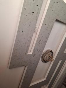 a ceiling view of a room with a door at ramadan in Tombouctou
