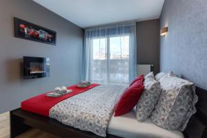 Posteľ alebo postele v izbe v ubytovaní Apartments of Pawia