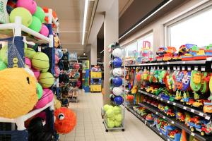 a store aisle with toys and other toys on display at Il Tridente Camping Village in Bibione