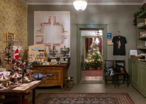 a store with a christmas tree in a room at Lang Resort in Raahe