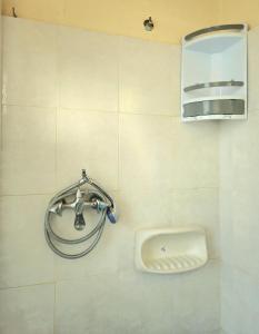 a bathroom with a sink and a faucet at Mary's apartment Elaia 3 in Elia Laconias +4 photos
